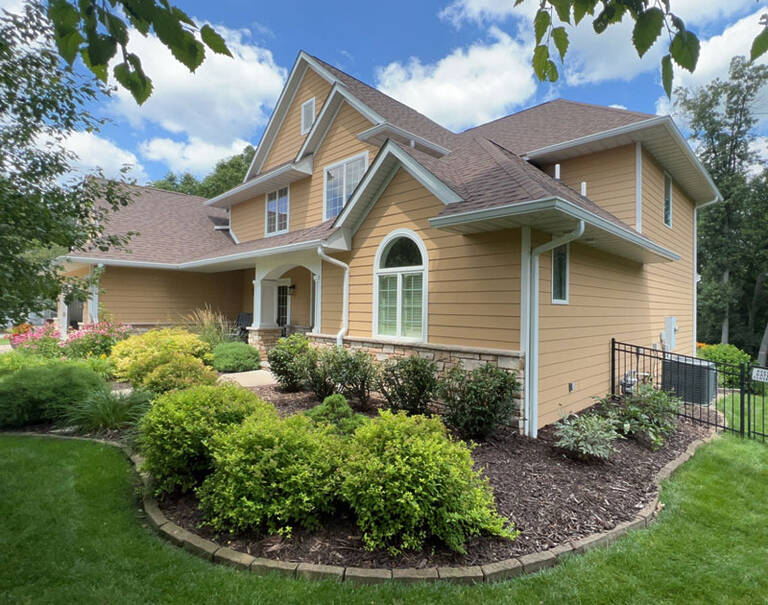 Yellow House With Gutters